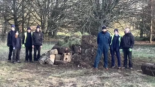Parks team posing with their new hibernaculum